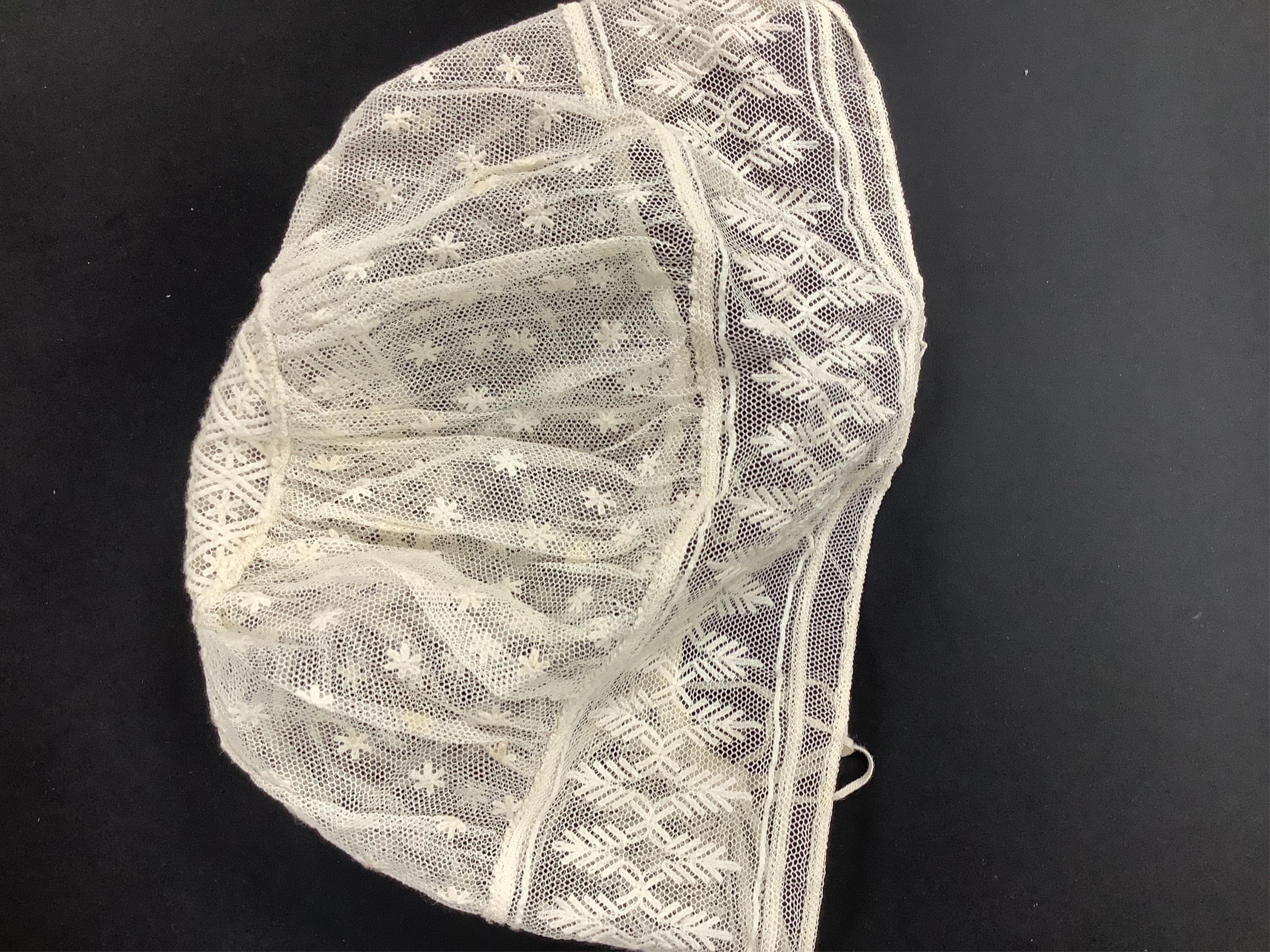 A collection of seventeen mixed late 18th, 19th and early 20th century wedding hankies. Mostly with fine lawn centres, some lace trimmed, white worked or monogram embroidered, together with a needle run on net baby bonne